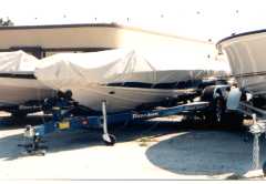 boat under cover in storage yard
